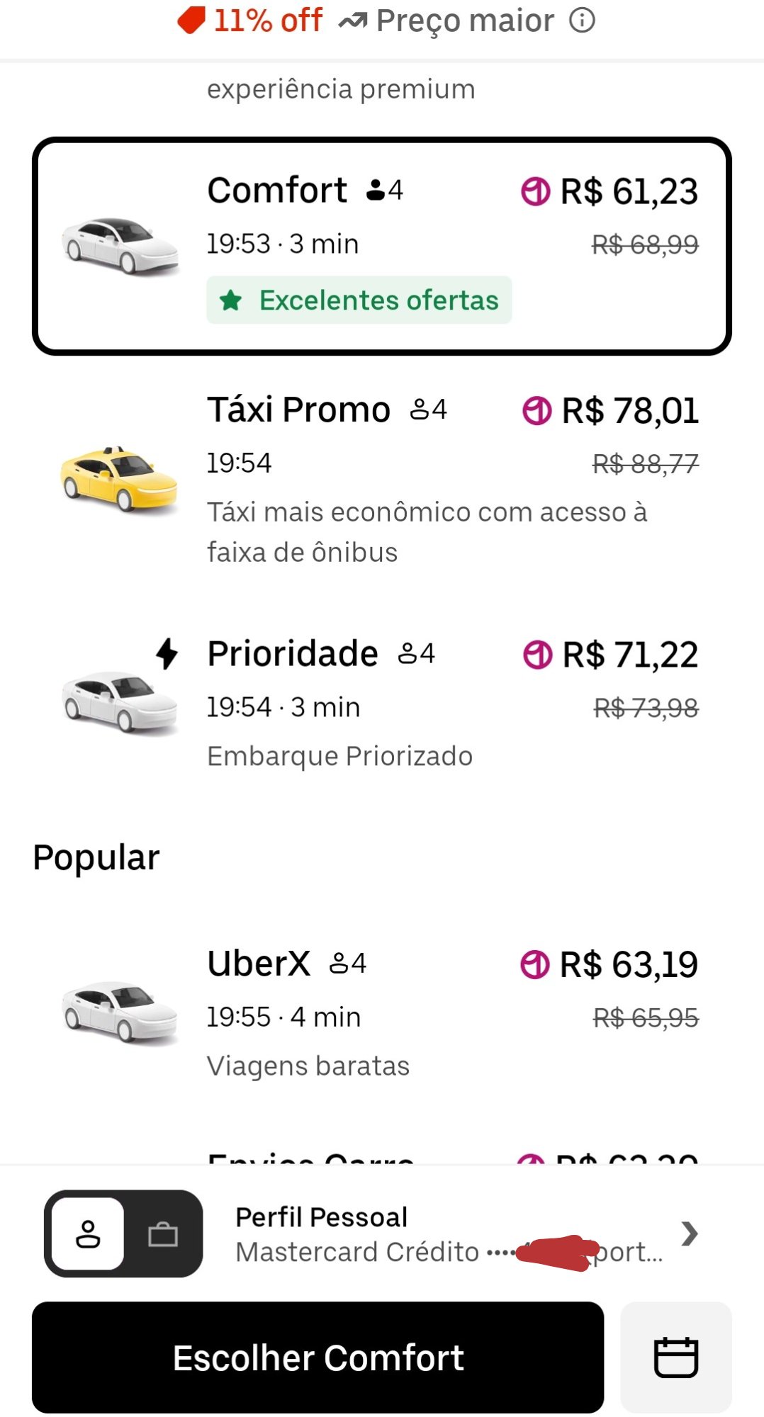 Tela do Uber com Comfort a R$ 61,23 e UberX a R$ 63,19, ambos com preço cheio riscado ao lado